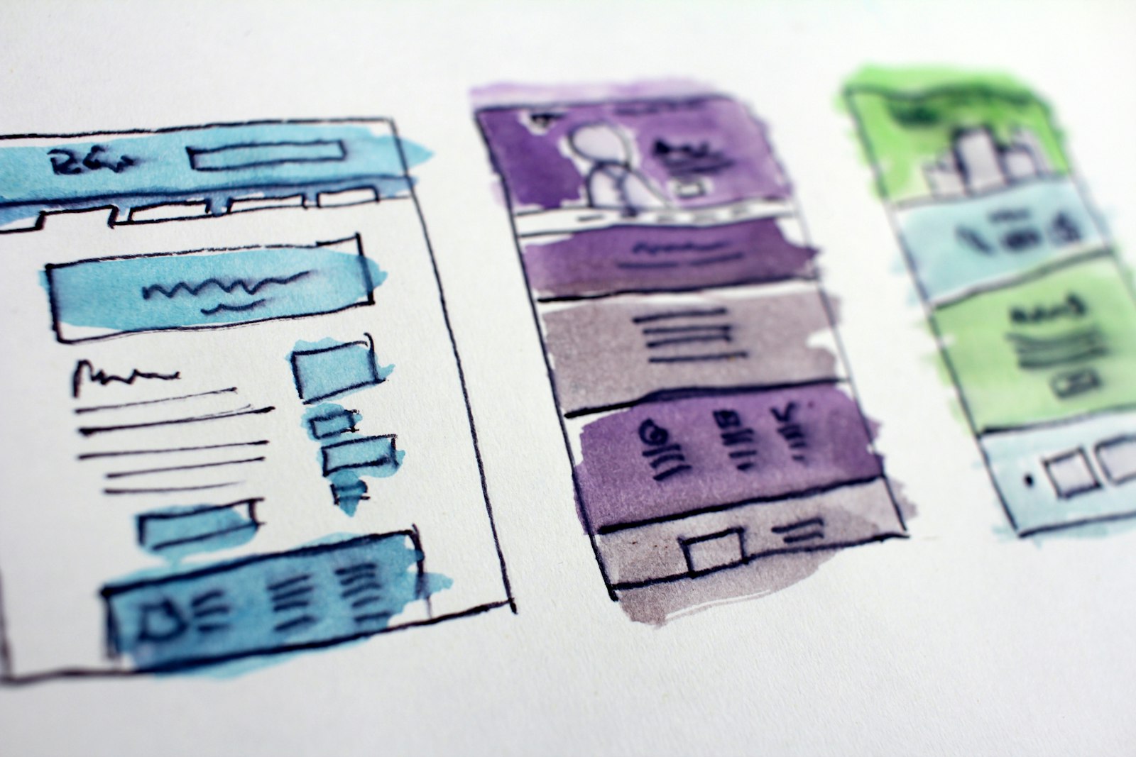 Wireframe sketches of website layouts