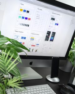 Monitor displaying a landing page design interface